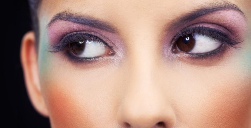 Highlighting her stunning eyes. the makup on a young womans eyes.